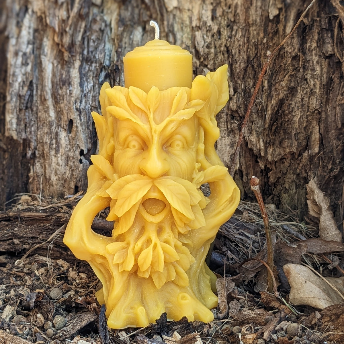 Our Father of the Forest Beeswax Candle is a striking depiction of old father time in a tree.  Lovely.