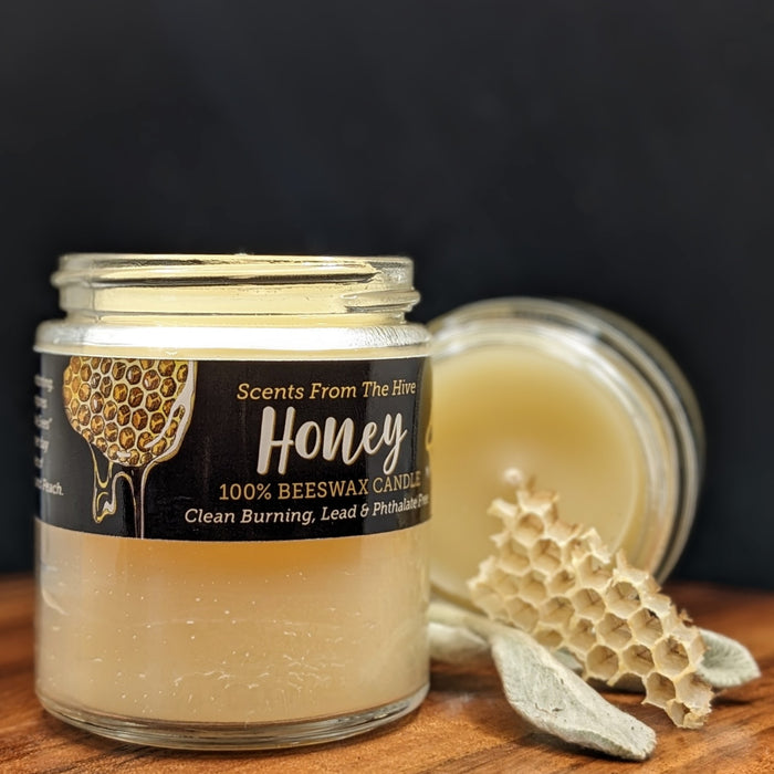 honey scented beeswax candle in a 4oz glass jar.
