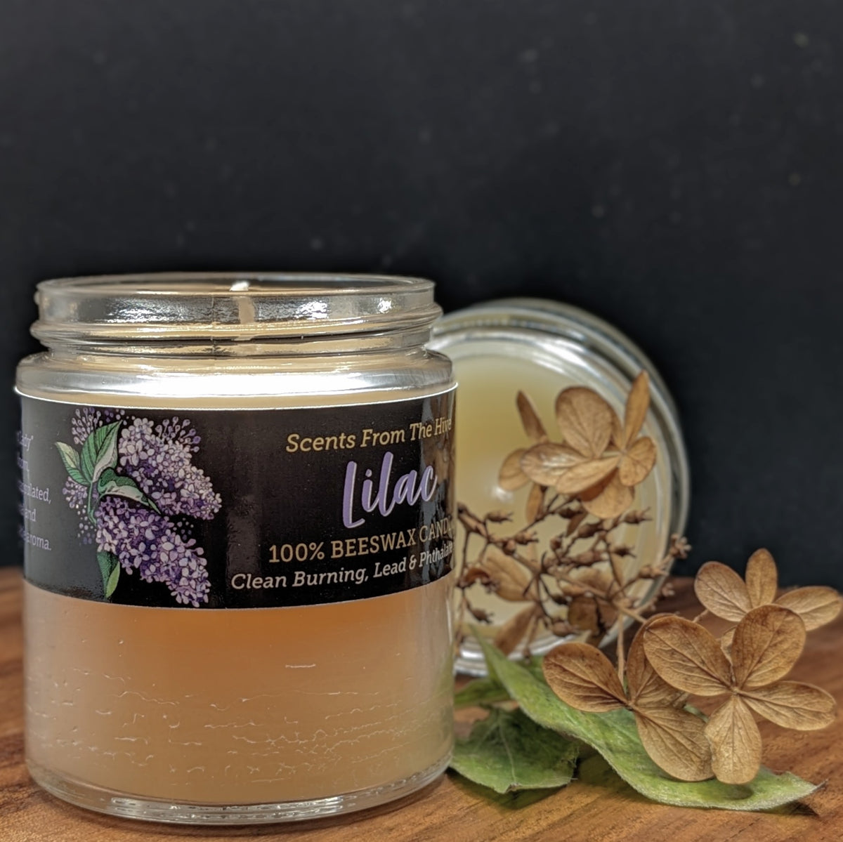 Lilac Scented Beeswax Candle in a 4oz glass jar. 20+ hour burn time.